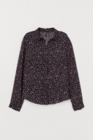 Blusa en tejido vaporoso 8.99 €