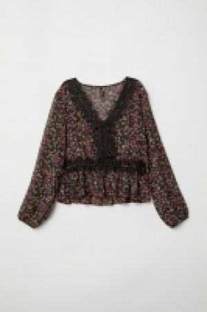 Blusa con escote de pico 12.99 €