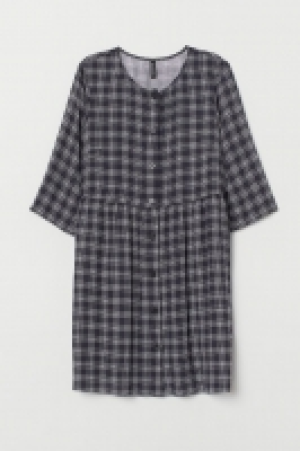 Vestido con botones 12.99 €
