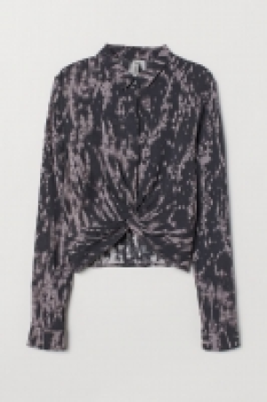 Blusa con nudo decorativo 5.99 €