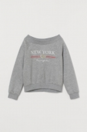 Jersey con hombro descubierto 7.99 €