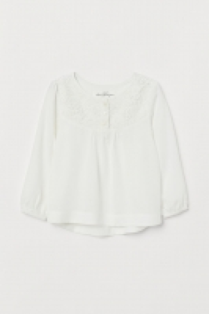 Blusa con canesú de encaje 8.99 €