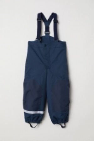 Pantalón outdoor con tirantes 14.99 €