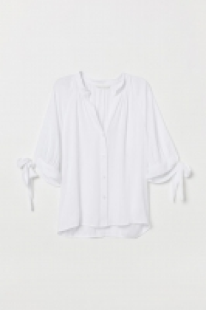 HM  Blusa con lazada en las mangas