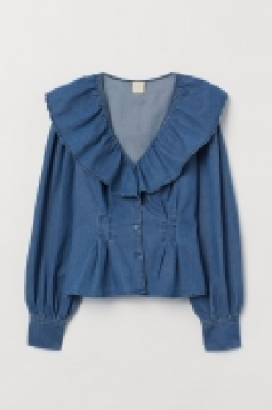 Blusa con volantes 24.99 €