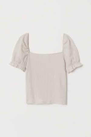 Top con mangas abullonadas 5.99 €