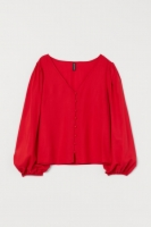 Blusa con mangas abullonadas 6.99 €