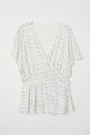 Top cruzado de punto 7.99 €