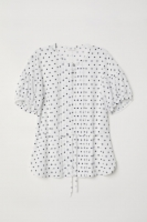 Blusa con mangas abullonadas 19.99 €