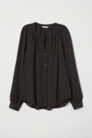 Blusa en tejido de crepé 11.99 €