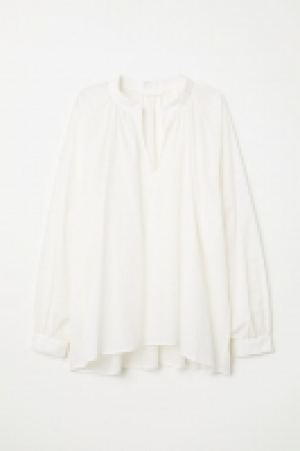 Blusa oversize 13.99 €