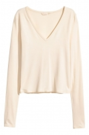 Top con escote de pico 16.99 €