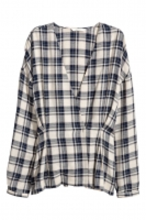 Blusa de doble botonadura 24.99 €