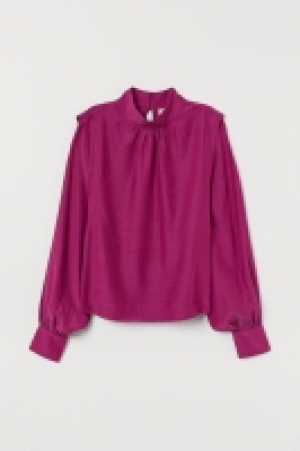 Blusa con cuello elevado 29.99 €