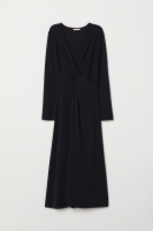 Vestido con escote de pico 24.99 €