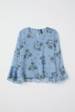 Blusa de gasa con volantes 11.99 €