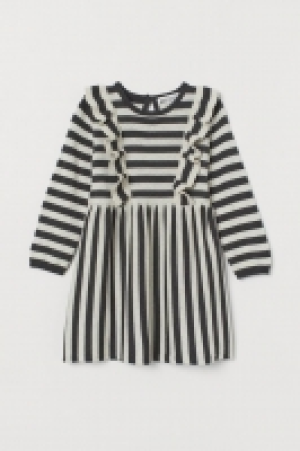 Vestido de punto con volantes 13.99 €