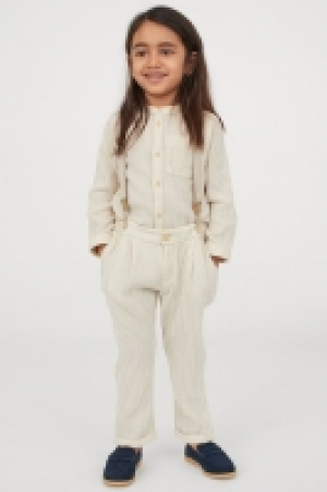 Pantalón con tirantes 15.99 €