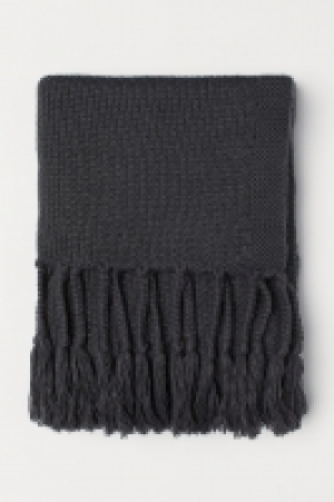 Manta de punto con flecos 34.99 €