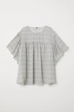 Blusa con mangas de volante 11.99 €