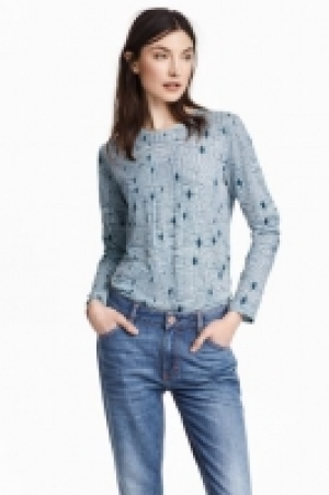 Top de manga larga en punto 13.99 €