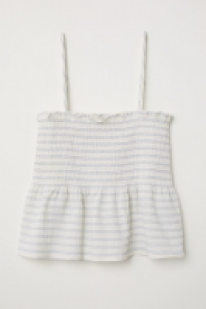 Top con fruncido y peplo 12.99 €