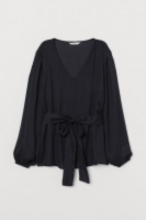 Blusa con cinturón de anudar 14.99 €