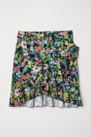 Falda de punto con volantes 9.99 €