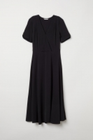Vestido en crepé 17.99 €