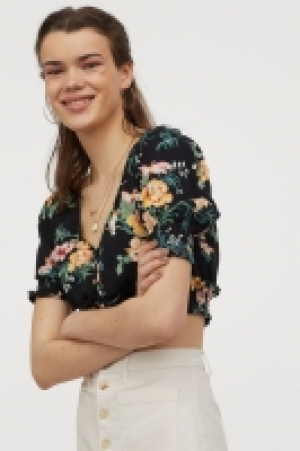 Top con detalle fruncido 11.99 €