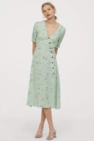 Vestido con escote de pico 17.99 €