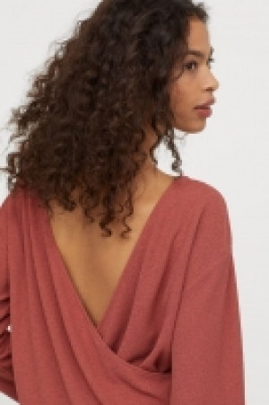 Top con espalda cruzada 8.99 €