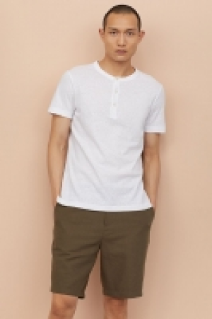 Pantalón corto en mezcla lino 23.99 €
