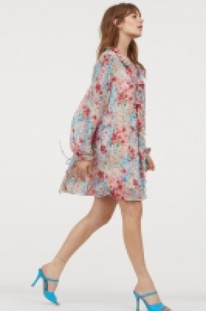 Vestido corto de volantes 12.99 €
