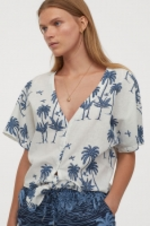 Blusa con lino y bajo anudado 10.99 €