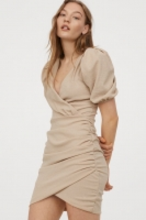 Vestido cruzado manga puffy 17.99 €