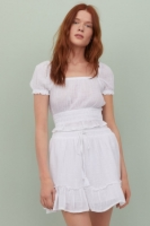 Falda corta de algodón 10.99 €