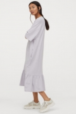 Vestido camiseta con volante 12.99 €