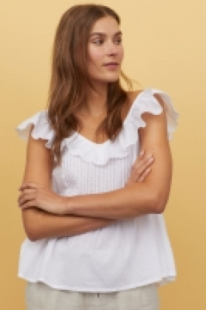 Top de algodón con volantes 12.99 €