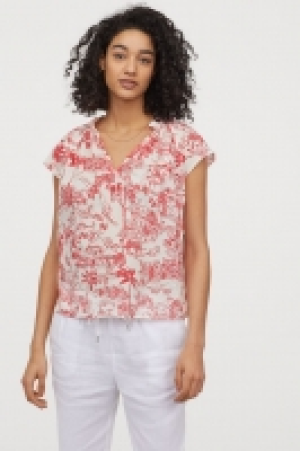 Blusa de algodón con lazada 8.99 €