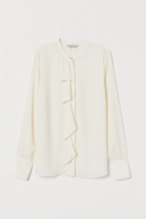 Blusa con volantes 12.99 €