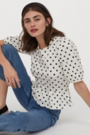 Top con peplo 10.99 €