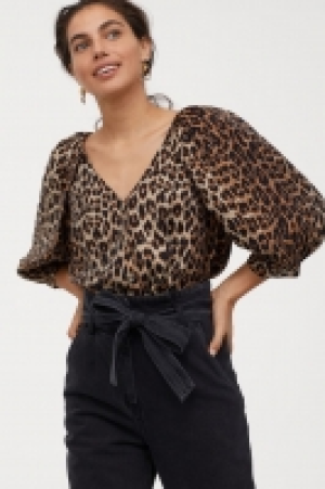 Blusa con mangas globo 10.99 €