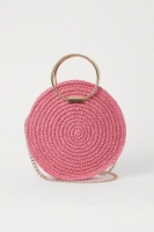 Bolso redondo de paja 19.99 €