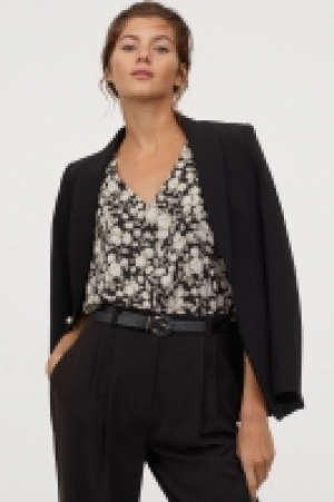 Blusa con manga circular 8.99 €