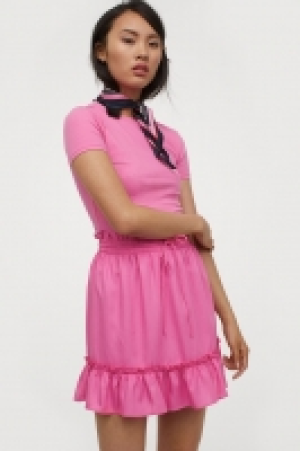 Falda corta con volantes 6.99 €
