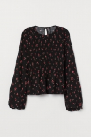 Top con peplo 5.99 €