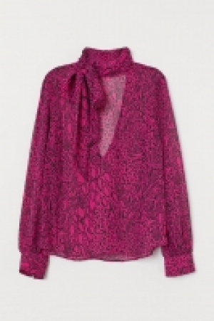 Blusa de gasa con lazada 9.99 €