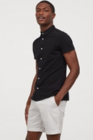 Camisa en piqué Muscle Fit 7.99 €