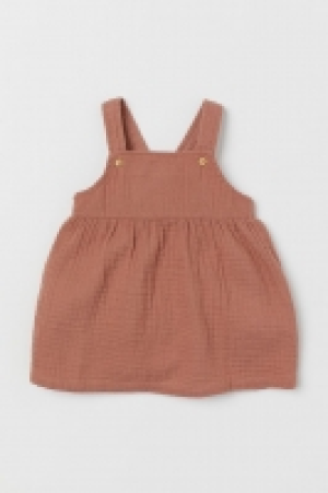 Vestido peto de doble tejido 9.99 €
